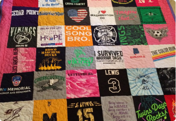 Colorful quilt made from a patchwork of t-shirts from races, teams, and memorial events
